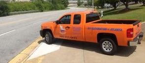 Water Damage and Mold Removal Pickup Truck At Residential Job